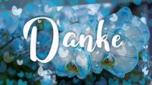 Das Wort "Danke" vor kleinen Herzen